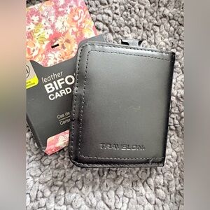 Travelon Black Leather Bifold Card Case with RFID Blocking Technology.